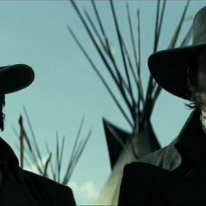 Steve Corona as Young Cole and Travis Hammer as Young Cavendish in The Lone Ranger