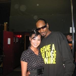 Janet Cho on set with Snoop Dogg