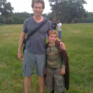 Josh Meyers with Kennon on the set of Inventing Adam