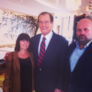 Still of My wife Nicola and Sir Roger Moore with Colin burt Vidler in London wishing him a happy 88th birthdaytrue Englishman!!!