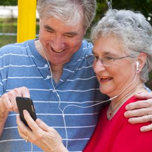 Senior couple using Ipod