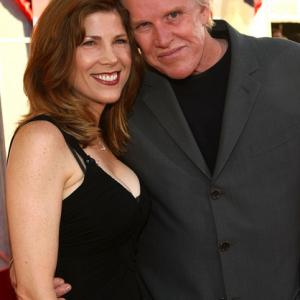 Steffanie Sampson and Gary Busey arrive at the world premiere of Touchstone Pictures' 