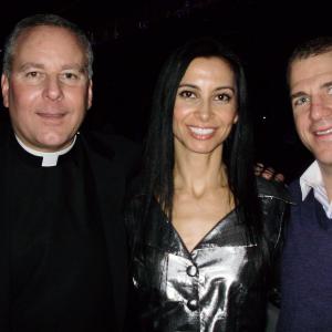 Father Flavin Jennifer Gjulameti and Mark Recchi from the Bruins THE FIGHTER