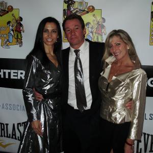 Jennifer Gjulameti, Arthur Wahlberg, and Susan Darian. (Women's outfits by KAREN WARREN. Matching Silver Metalic tie by 2-HIP.) THE FIGHTER.