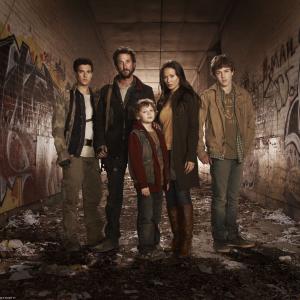 Promotional still from the TNT series 'Falling Skies'. From left to right: Drew Roy as Hal, Noah Wyle as Tom, Maxim Knight as Matt, Moon Bloodgood as Anne and Connor Jessup as Ben.