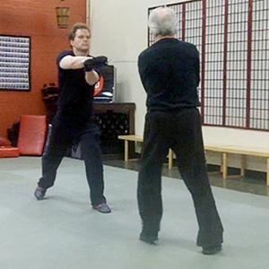 Mark Hildebrandt training in medieval sword fighting with Robert Goodwin.