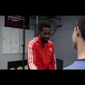 Dartel playing Larry the Trainer in the webseries Two Awkward Dudes