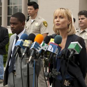 Still of Harry Lennix and Radha Mitchell in Evidence (2013)