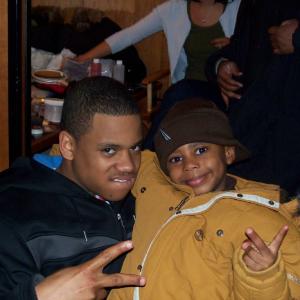 Avery taking a break while filming the movie Indelible and joking around with fellow actor Tristan Wilds