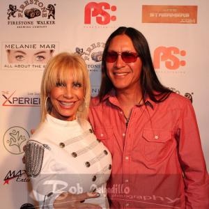 2013 red carpet event in Beverly Hills. Rick Mora and Nadia Sahari