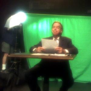 As a newsman using green screen