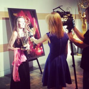 Melissa being interviewed by Tiffany Taylor of mtvU after winning her emmys at the 36th College Television Awards on April 23 2015