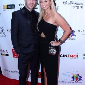 Angeline Rose Troy with HGTV's JD Scott at the 2014 CUN Oscar gala