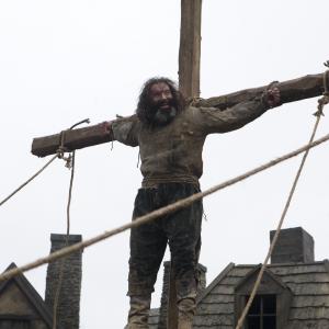 Solomon Kane (2009). I'm about 3 meters off the ground here. It was a freezing cold day and I'm laughing because Mark Henson, the stunt co-ordinator, has begun singing 'Always Look on the Bright Side of Life' on the next cross up.