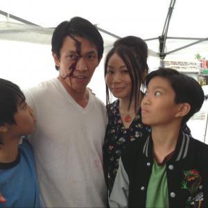Still of Linda Wang Mrs Wan Alex Fox Young Sonny Wan Michael Gregory Fung Young Steven Wan and ShangHo Huang Tien Chau Manager in Martin Scorseses  Revenge of the Green Dragons