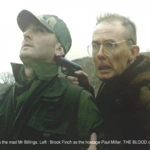 Right Ro J Goodwin as the mad Mr Billings Left Brook Finch as the hostage Paul Miller From the forthcoming feature THE BLOOD directed by Peter Montgomery