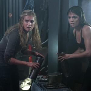 Still of Eliza Taylor and Marie Avgeropoulos in The 100 2014