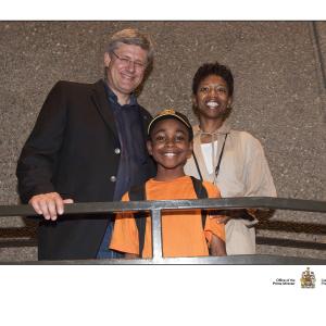 A post Lion King performance photo with the Prime Minister of Canada, The Honourable Stephen Harper