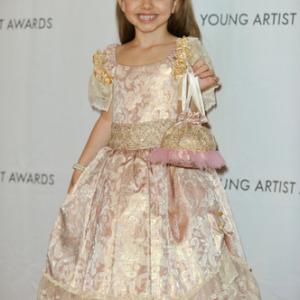 Caitlin Carmichael wearing Wanda Beauchamp on the red carpet at the Young Artist Awards 2011