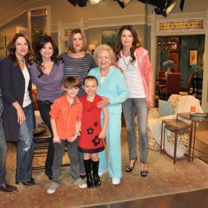 Caitlin Carmichael at curtain call for Hot in Cleveland January 2011