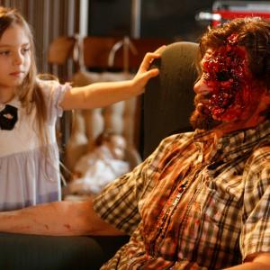 Caitlin Carmichael and Don Swayze on set of feature film Lizzie January 2010