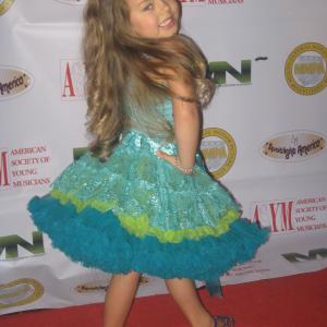 Caitlin at her first red carpet event MMPA Holiday Extravaganza 121808 wearing Kaiya Eve Couture