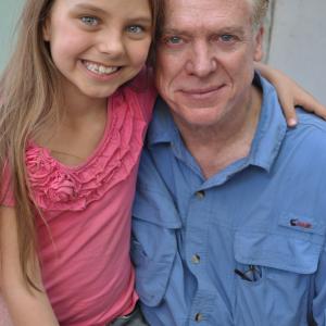 Caitlin Carmichael and Christopher McDonald on set of 