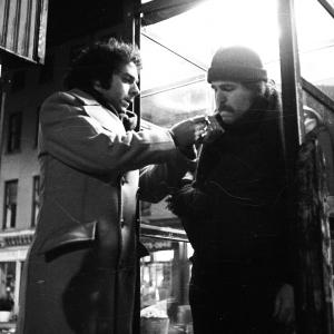 Actor Bob Murray lights a cigarette for Bill Reilly in Jeffrey Wisotsky's NYU student film, THE FORTUNE TELLER.