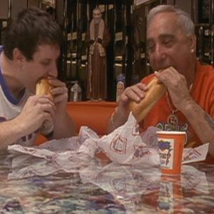 Director Ben Daniels and Genos Owner Joey Vento share a bite together