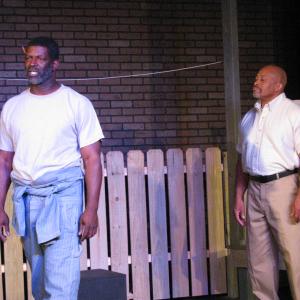 Jim Bono Jay DeVon Johnson is the loveable and wise best friend to Troy Maxon Henry Clay Middleton in August Wilsons Fences performed at the South of Broadway Theater 2014