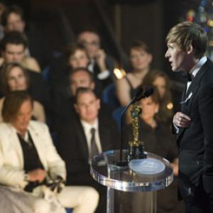 Dustin Lance Black accepts the Oscar® for Writing (Original Screenplay) for 