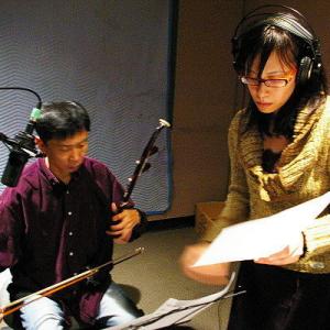 Food for the Gods star and composer Dr Yvette Lu conducts Chinese erhu master Xu Qian in a Vancouver studio