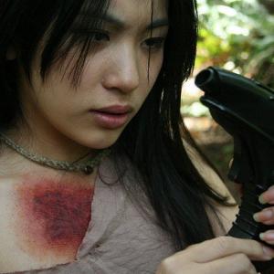Princess Xionko (Beverly Wu) contemplates the power of an incredible weapon.