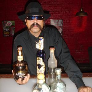 Miguel Corona as bartender in Tijuana Sunrise