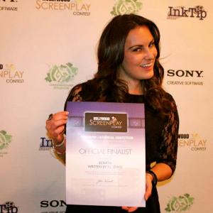 My friend Ashley Alvarado accepting a screenwriting award for me in Burbank