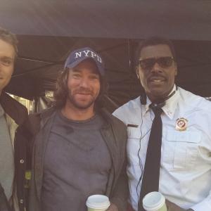 Ryan Carr and actors Eamonn Walker and Jesse Spencer on the set of Chicago Fire