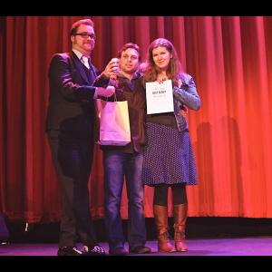 Conor Gomez middle with Nancy Shaw and Tyler James Nichol accepting the Award for Best Script at the 2011 Bloodshots Film Festival Photo taken at the historic Rio Theater in Vancouver BC