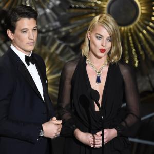 Miles Teller and Margot Robbie at event of The Oscars 2015