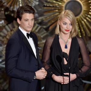 Miles Teller and Margot Robbie at event of The Oscars 2015