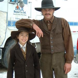 On the set of INTO THE WEST Dec 2004 Samuel Patrick Chu as Jacob Jr and Skeet Ulrich Jethro