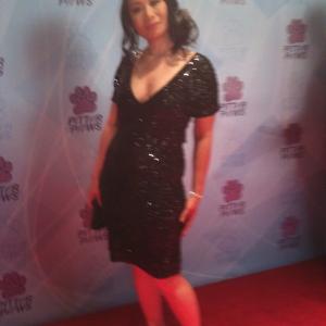 Still photograph of Linda Wang at Paws for Cause gala Dress by Designer LWren Scott
