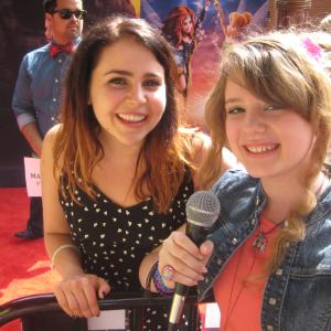 Piper Reese interviewing Mae Whitman at the premiere for 