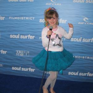 Piper Reese on the blue carpet at the Soul Surfer Hollywood Premiere