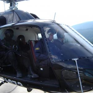 Steve Gray flying FBI picture helicopter on the set of Shooter