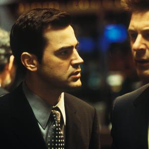 Still of Alec Baldwin and Ron Livingston in The Cooler 2003