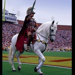 Traveler and Tommy Trojan, official mascot of USC