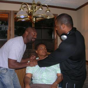 Director Willie Speight with actor Ro Brooks, and actor Margaret Floyd, on the set of The Holloway Story.