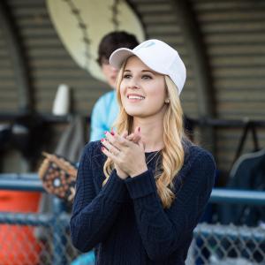 Emily (Caroline Sunshine) cheers on the Owls on and off the field.