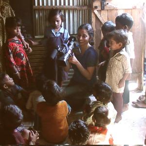 Ana Tiwary filming in Mumbai slum school.