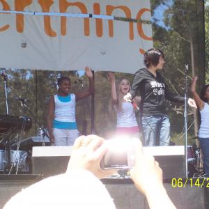 on stage at Alice Summerthing